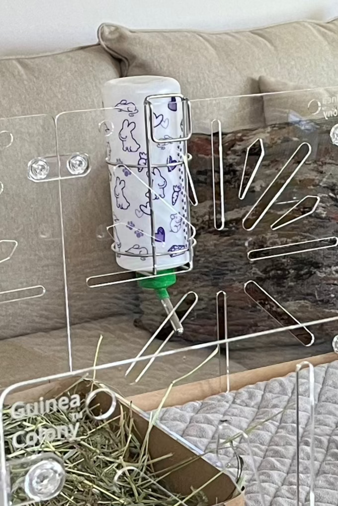 This Guinea Pig Cage simple water bottle holder fits almost any water bottle.